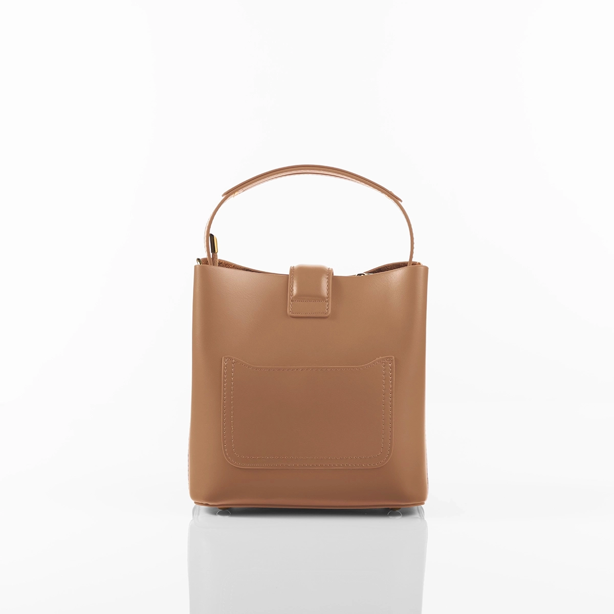 Modern luxury handbag styled for formal setting