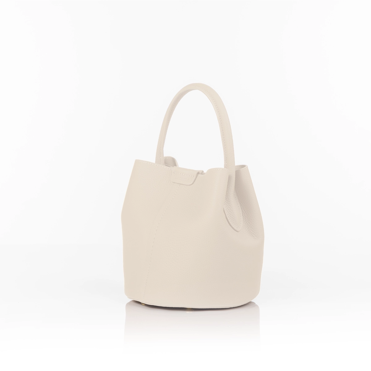 Modern luxury handbag styled for formal setting