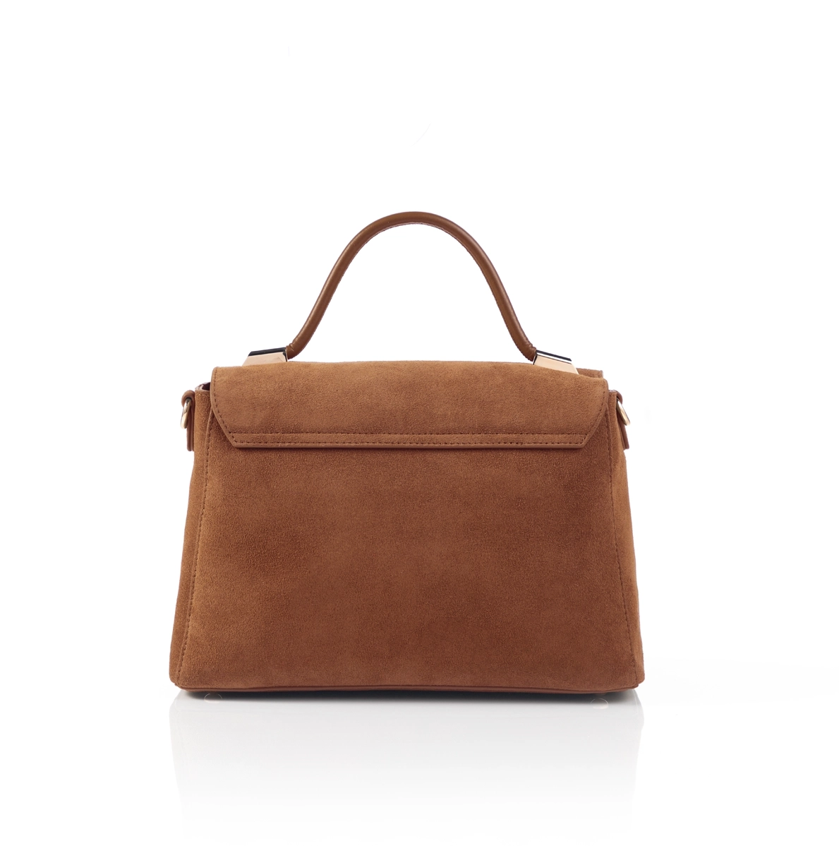 Modern luxury handbag styled for formal setting